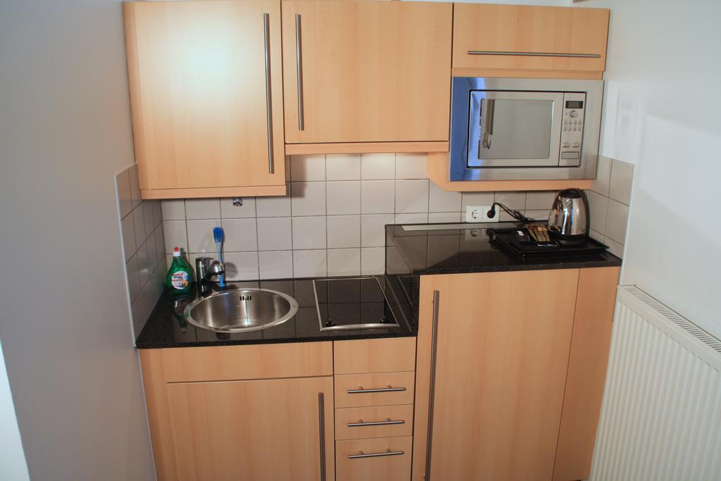 Essen City Suites Phòng bức ảnh